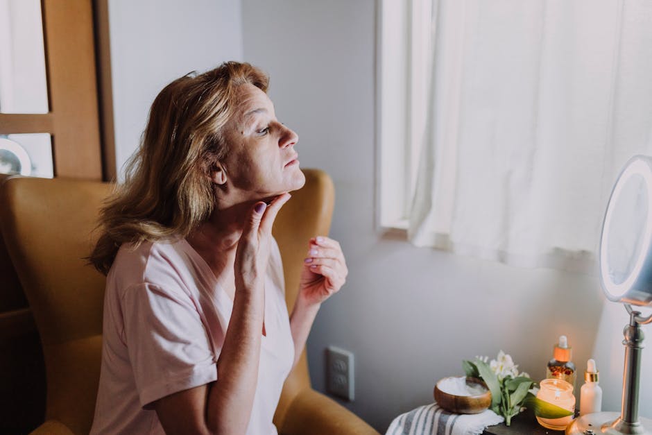tired woman checking skin health natural light